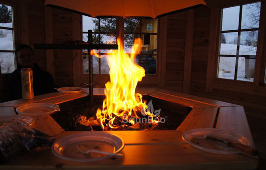 Interior view of Barrel Saunas gardenhouse lodge seating up to 10 guests