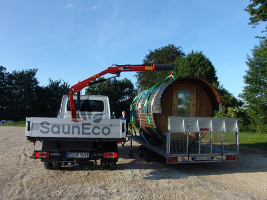 Thermowood barrel sauna in outdoor garden setting