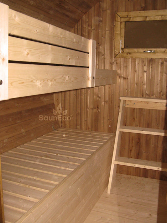 Thermowood barrel hotel lodge interior showing 4 beds